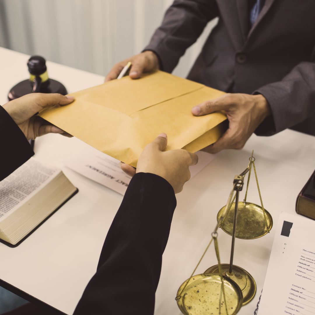 lawyer handing over court evidence